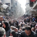 En medio de la guerra, miles se convierten en Siria