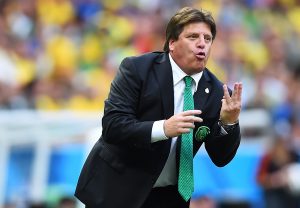FORTALEZA, BRAZIL - JUNE 17: Head coach Miguel Herrera of Mexico gestures during the 2014 FIFA World Cup Brazil Group A match between Brazil and Mexico at Castelao on June 17, 2014 in Fortaleza, Brazil. (Photo by Laurence Griffiths/Getty Images)