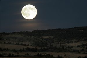 A full moon rises over the mountains just east of Laramie, Wyo., Wednesday, Sept. 26, 2007. (AP Photo/Laramie Boomerang, Ben Woloszyn) Moon Rise Moon Rise Moon Rise